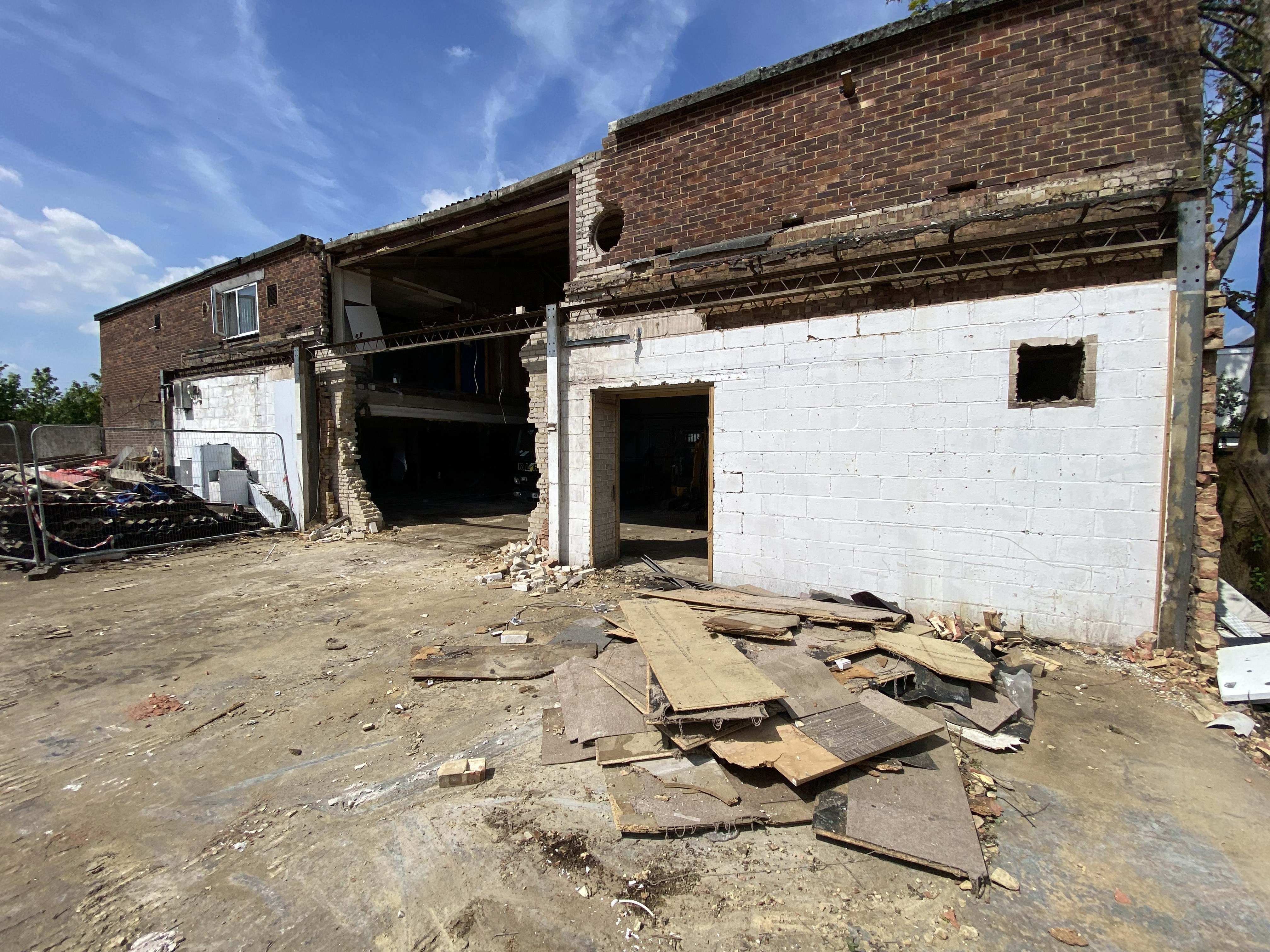Demolition main building front elevation partially demolished