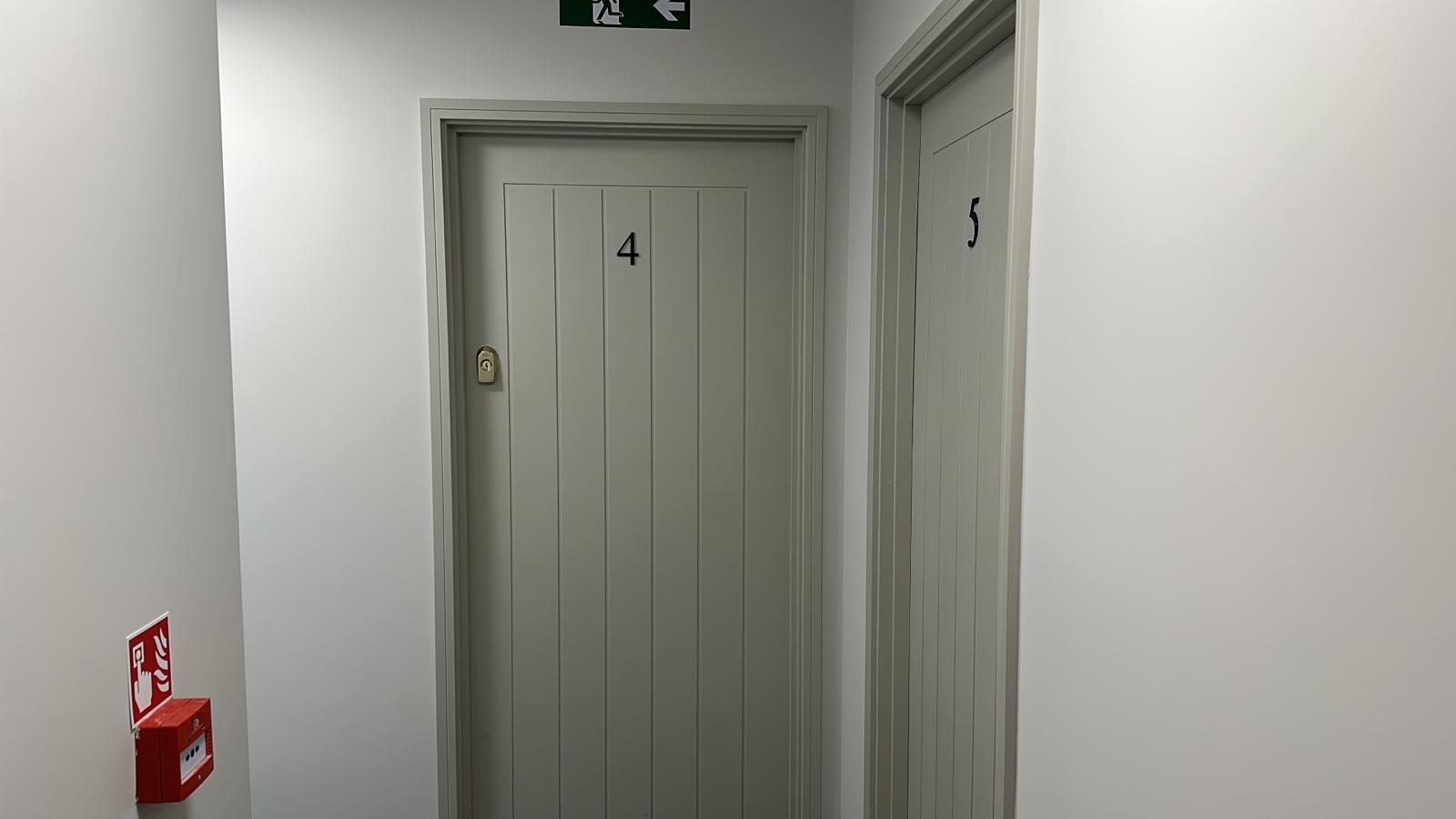 Communal landing apartment entrance doors