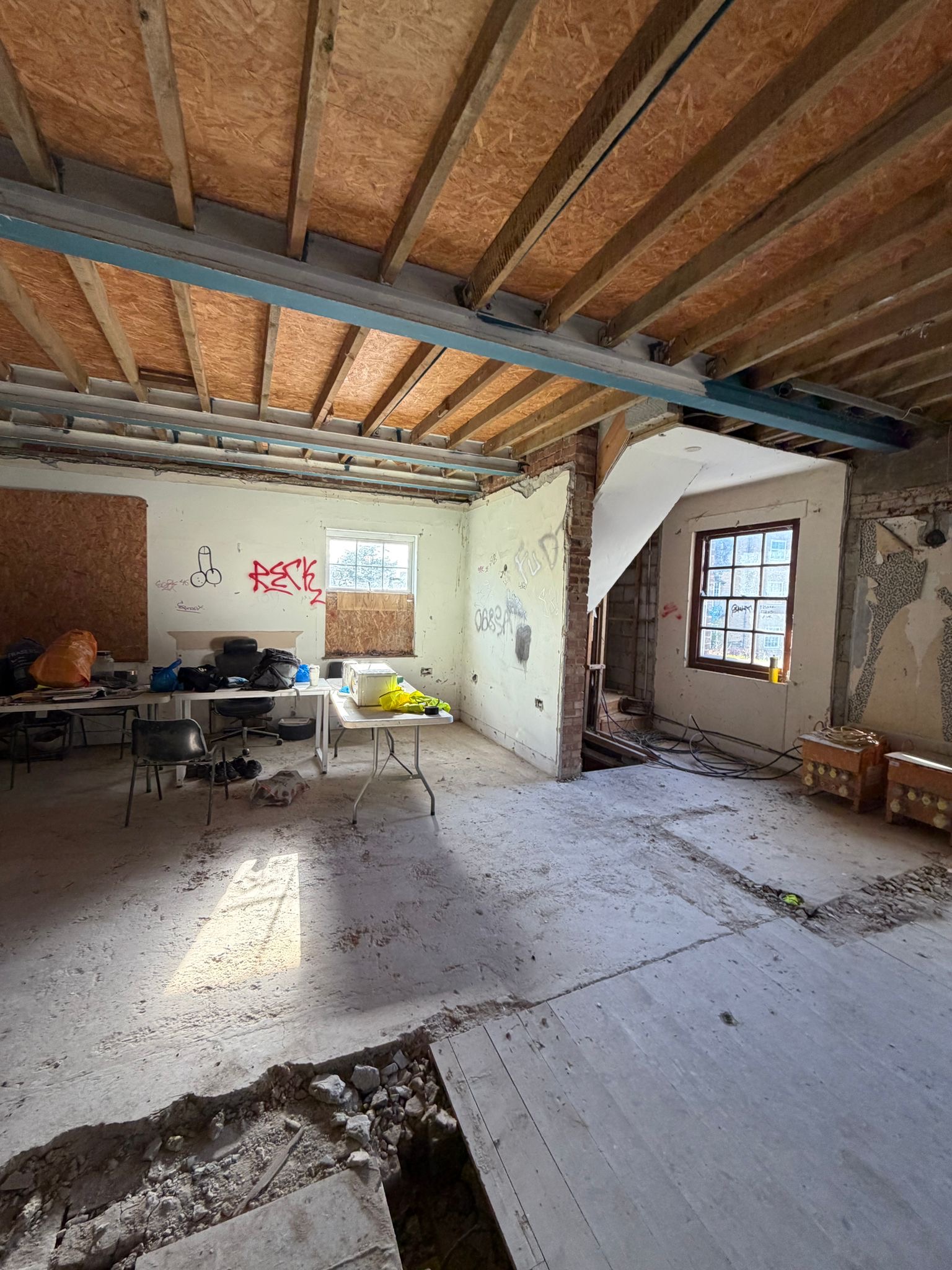 Strip out exposed floor structure and stripped interior